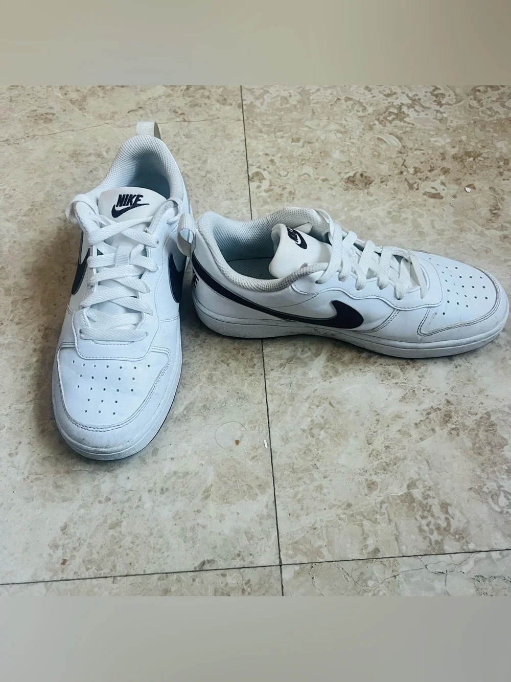 Nike White Low-Top Sneakers with Navy Swoosh